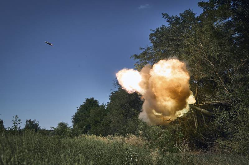 Ukrainian soldiers fire a self-propelled howitzer towards Russian positions at the front line in Donetsk region, Ukraine, Wednesday, Aug. 9, 2023.